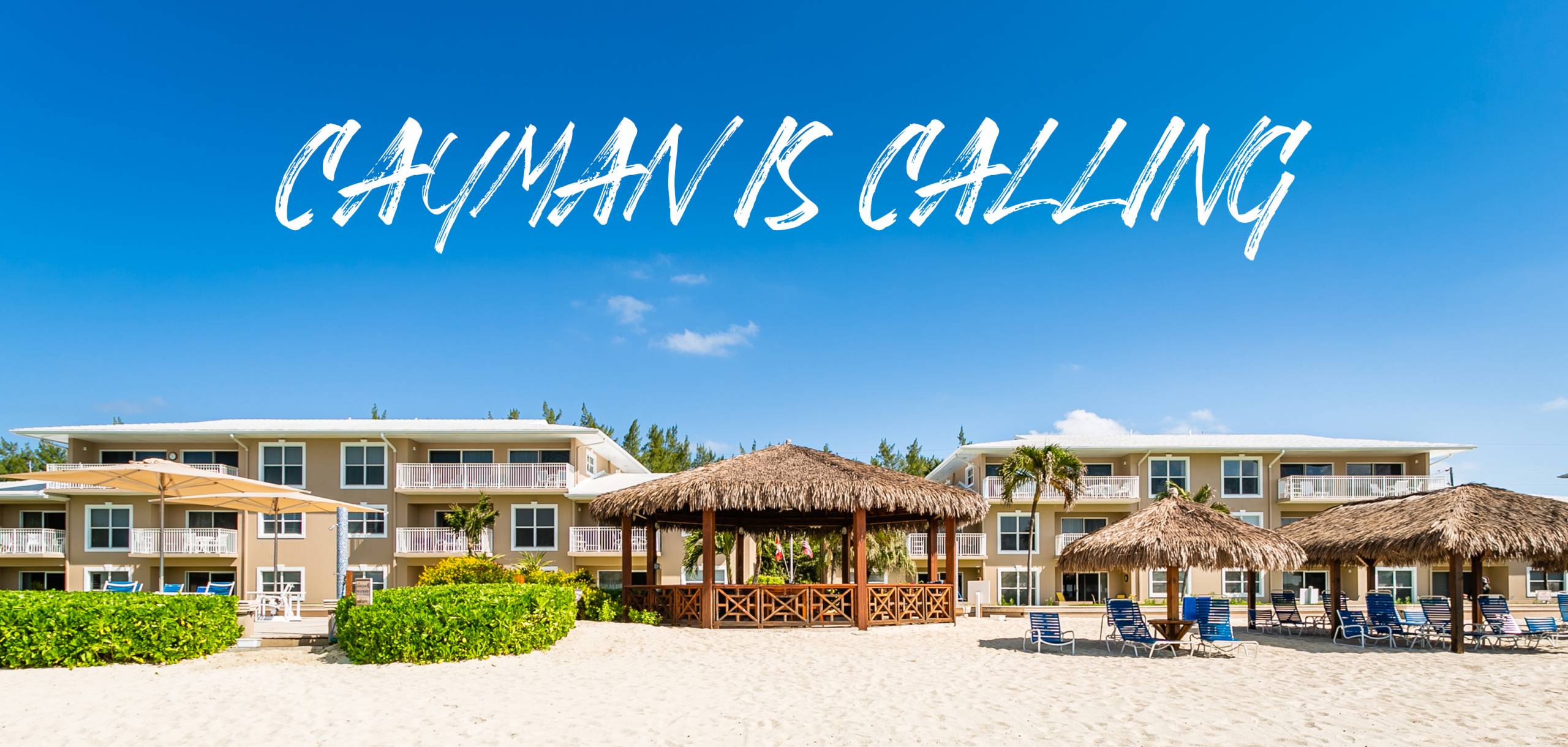 view of condominium complex from beach