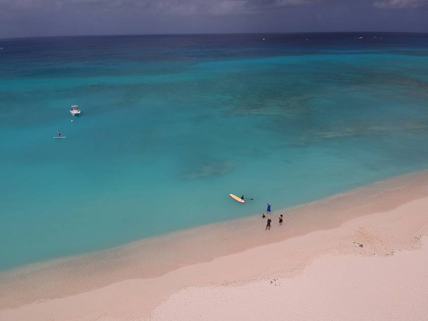 moody blue water from drone