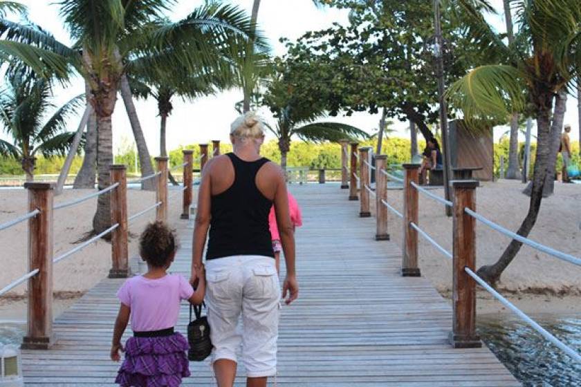 family crossing bridge