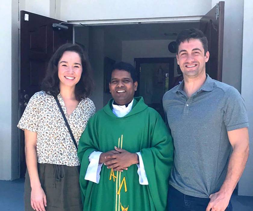 Father Edwin with Claire and her boyfriend, Devon