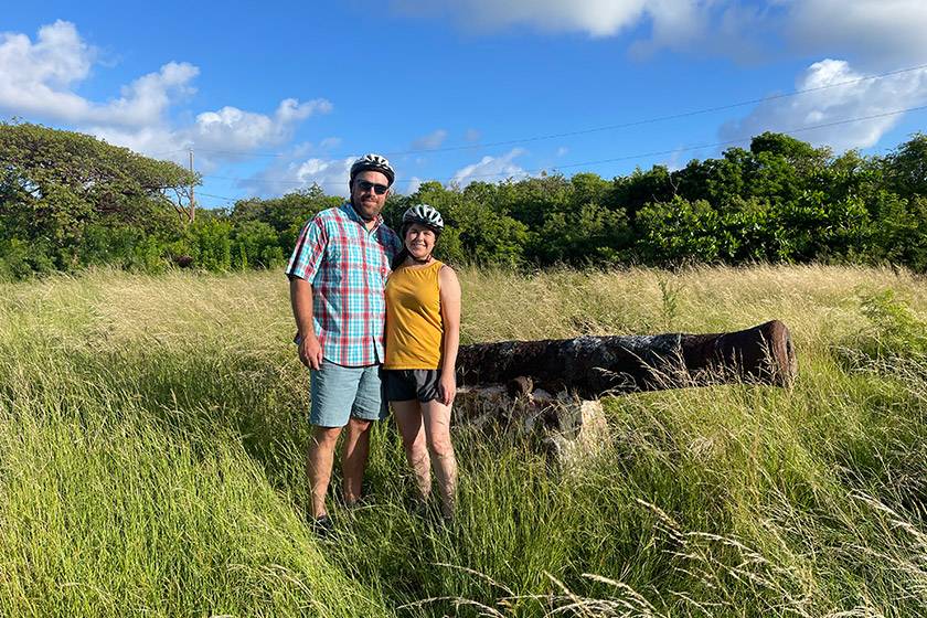 couple by cannon in East End field