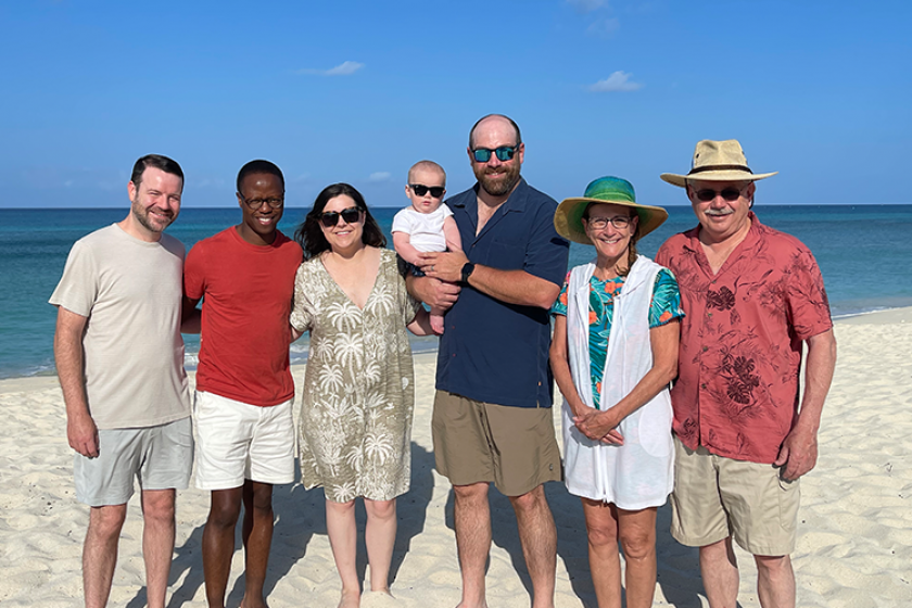 big family supports traveling parents