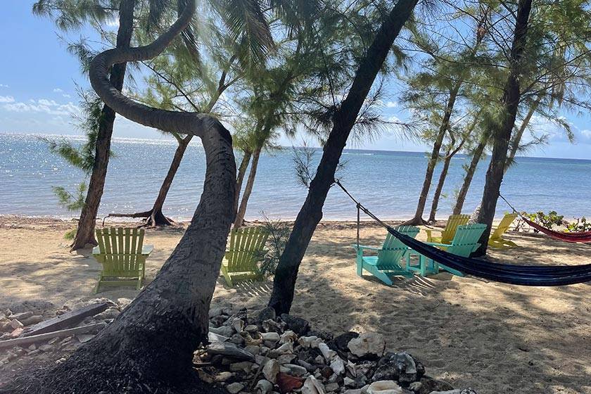 hammocks and chairs on beach