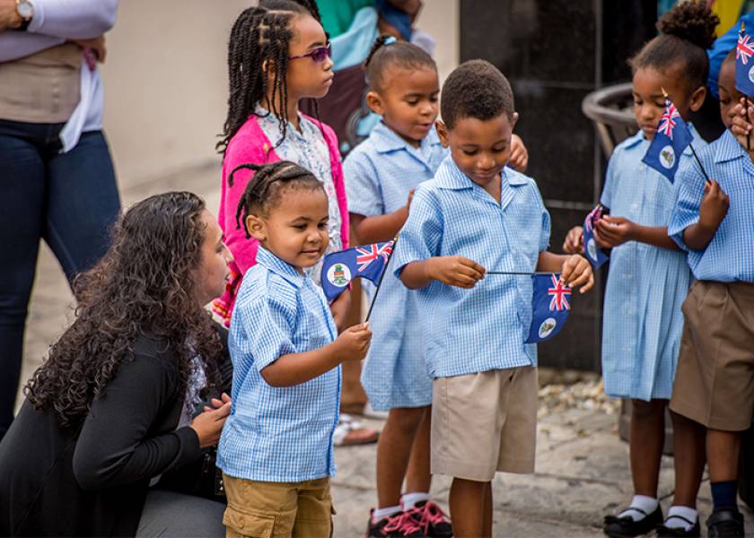 kids with Cayman flag