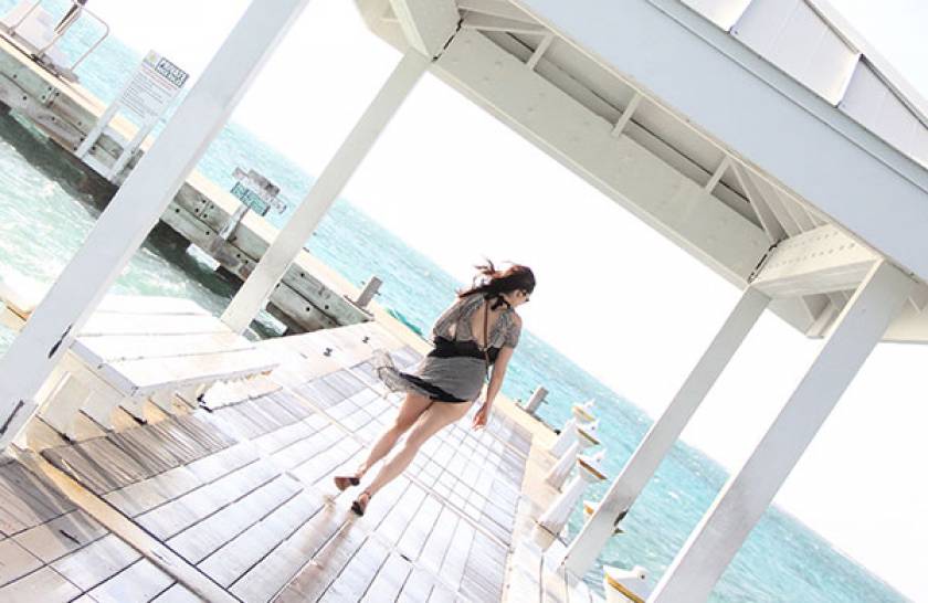 woman on pier at rum point